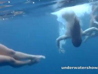 3 girls stripping in the sea